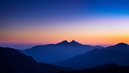 Fototapeta premium mountain silhouette at dusk with gradient sky