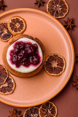 Cinnamon roll, a sweet bun with citrus, cherries, and chocolate, a Danish dessert with cream