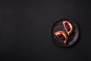 Cinnamon roll, a sweet bun with citrus, cherries, and chocolate, a Danish dessert with cream