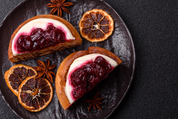 Cinnamon roll, a sweet bun with citrus, cherries, and chocolate, a Danish dessert with cream
