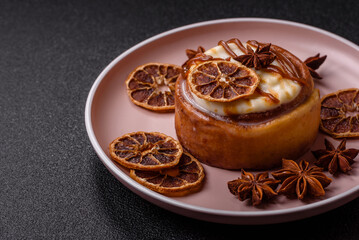 Cinnamon roll, a sweet bun with citrus, cherries, and chocolate, a Danish dessert with cream