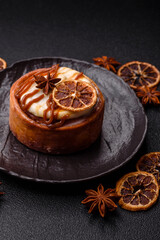 Cinnamon roll, a sweet bun with citrus, cherries, and chocolate, a Danish dessert with cream