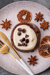 Cinnamon roll, a sweet bun with citrus, cherries, and chocolate, a Danish dessert with cream