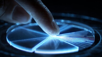 Fingertip activating holographic blue and white pie chart digital interface close-up view futuristic environment interactive technology concept