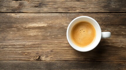 cup of coffee on an old wooden table