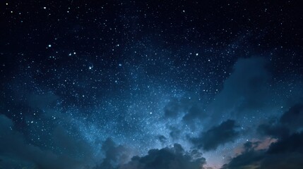 Obraz premium Night Sky Celestial Display with Clouds and Stars.