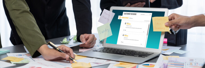 Analyst team use sticky note for creative and analytic brainstorm for business idea with BI data dashboard on laptop screen. Analysis financial data visualization tech for marketing strategy. Prodigy