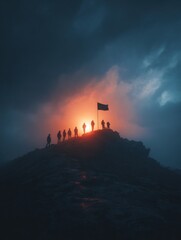 Obraz premium Silhouette of hikers on a mountain ridge against the backdrop of a vibrant sunset, with dark clouds creating a dramatic sky.