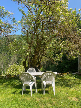 Garden Table with Chairs in Sunny Countryside