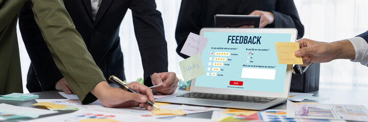 Analyst team use sticky note for creative and analytic brainstorm for business idea with BI data dashboard on laptop screen. Analysis financial data visualization tech for marketing strategy. Prodigy