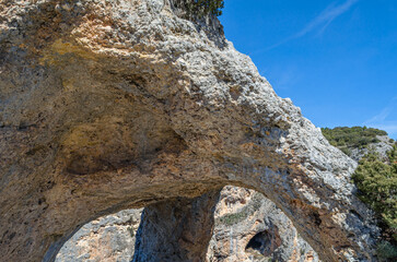 Devil's Window, an example of karst erosion on limestone rock in the Serrania de Cuenca Natural Park, Spain