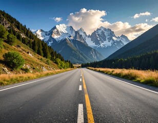 Fototapeta premium A paved road winds through a valley nestled amongst tall mountains, blanketed in snow, under a vibrant blue sky.