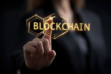 Businesswoman highlights blockchain technology with digital hexagon representation and illuminated text in a modern corporate setting