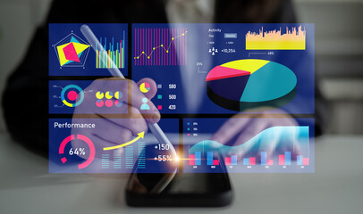 Modern office scene featuring a close-up of hands using a digital tablet, showcasing dynamic...