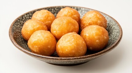 Golden Fried Dough Balls in Ceramic Bowl
