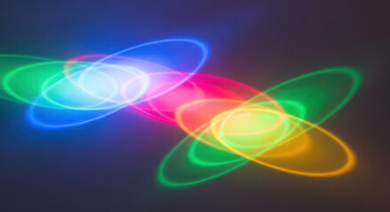 Overlapping chromatic ellipses with luminous color gradients create visual harmony and visual