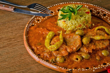 Traditional Mexican Beef Stew (Guisado de Res) with Rice and Olives