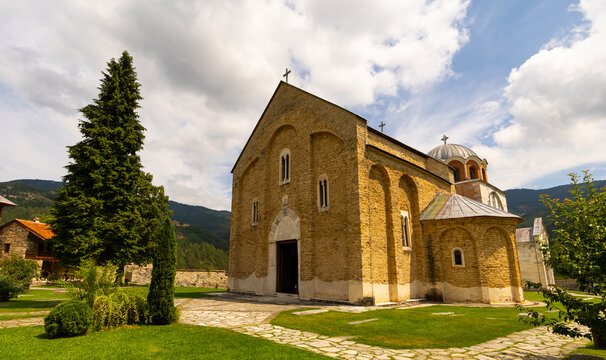 Monastery compound in city of Gradac. Austere design, sandstone walls, and narrow loophole windows represent religious European architecture of 14th century..
