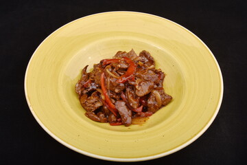 Pan-fried pork neck with peppers and onions