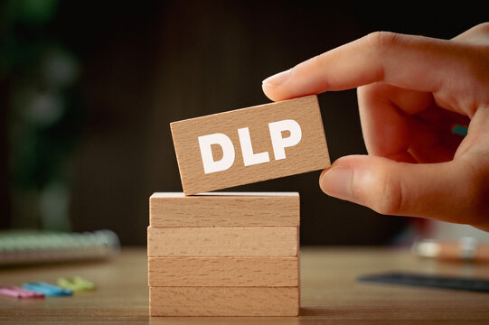 There is wood block with the word DLP. It is an abbreviation for Data Loss Prevention as eye-catching image.