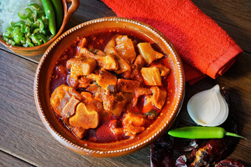 Hearty Mexican Pork and Vegetable Stew (Mole de Olla) in a Clay Bowl