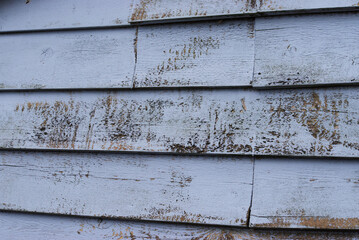 Worn painted siding