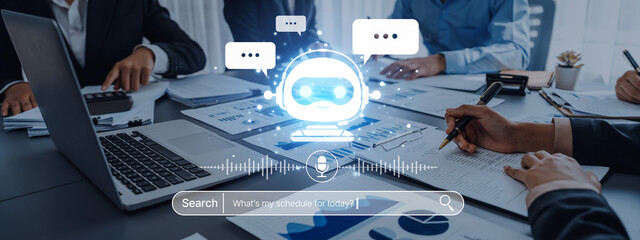Modern business meeting showcasing teamwork with a digital AI chatbot. The scene illustrates interaction and collaboration in a professional office environment. Trope