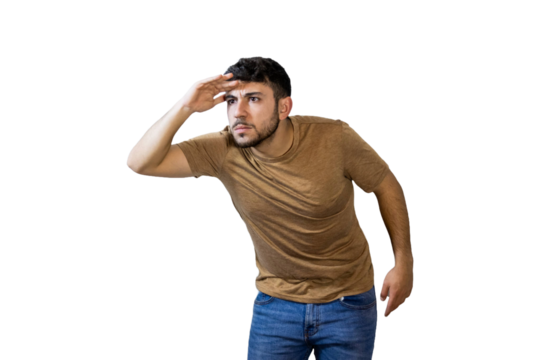 Young man searching and looking far away on white background. PNG