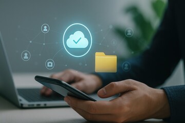 Business person using smartphone with holographic cloud and folder icons for secure file sharing and digital collaboration