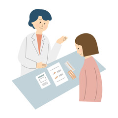 Obraz premium 処方された薬について服薬指導をする薬剤師