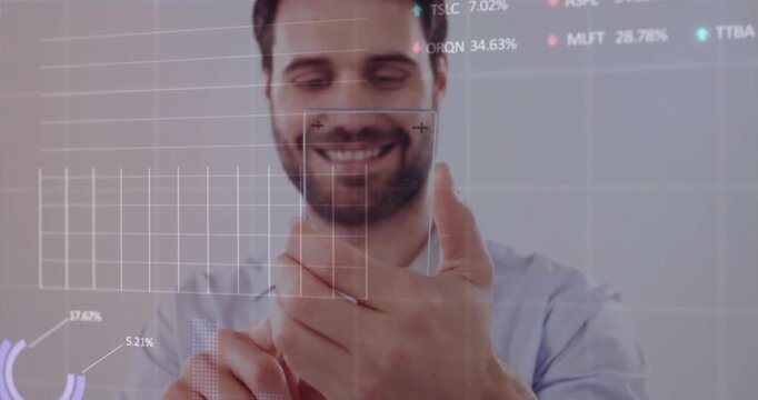 Man lifting smartphone tapping screen while UI grid face box charts animating for data analytics