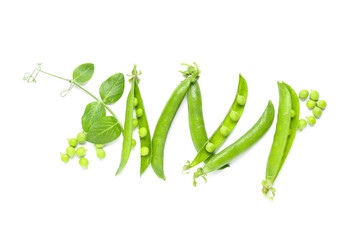 Green pea pods and leaves on white background
