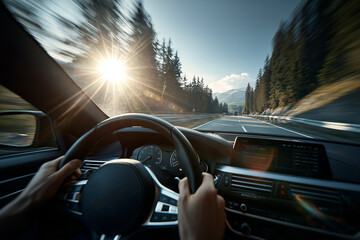 Naklejka premium A close-up of a hand on a steering wheel, driving into a bright, setting sun on a winding road, symbolizing a journey, focus, and destination.