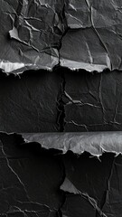 Textured Black Wrinkled Paper With Jagged Edges Close Up Abstract Background