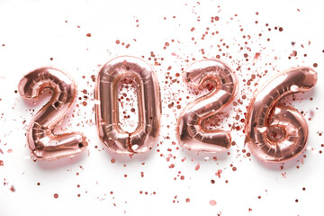 2026 made from balloons and confetti. Happy New Year
