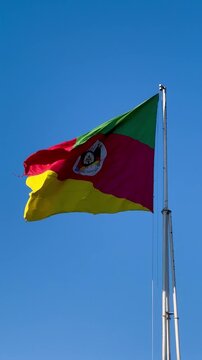 Flag of the state of Rio Grande do Sul waving in the wind. Gaucho flag. Week in Southern Brazil, Farroupilha Week of the Ga&uacute;chos.