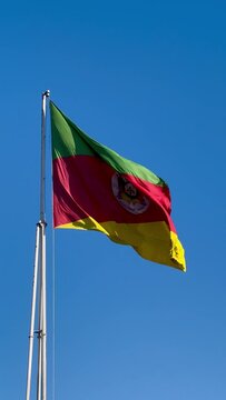 Flag of the state of Rio Grande do Sul waving in the wind. Gaucho flag. Week in Southern Brazil, Farroupilha Week of the Ga&uacute;chos.