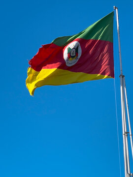 Flag of the state of Rio Grande do Sul waving in the wind. Gaucho flag. Week in Southern Brazil, Farroupilha Week of the Ga&uacute;chos.