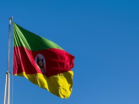 Flag of the state of Rio Grande do Sul waving in the wind. Gaucho flag. Week in Southern Brazil, Farroupilha Week of the Ga&uacute;chos.