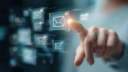 Hand selecting email icon on a digital interface