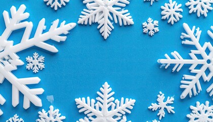 Snowflakes frame a vibrant blue background