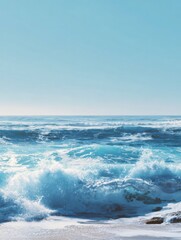 Obraz premium Waves Crashing on a Serene Beach With Clear Blue Skies on a Sunny Day