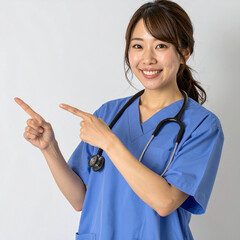 指差しで案内する笑顔の女性医師