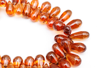 Hessonite Garnet Faceted Briolette Beads on White