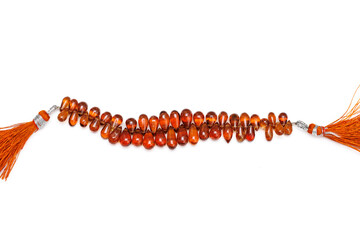 Hessonite Garnet Faceted Briolette Beads on White