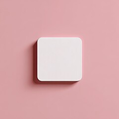 A minimalist square with rounded edges in a soft white floats centered on a pink backdrop