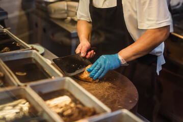 chef preparing grilled chicken dish