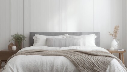 Fototapeta premium Patterned pillow on the king size bed in white simple bedroom interior in elegant apartment, real photo 