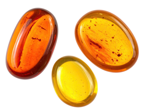 Three oval-shaped amber stones, varying in shades