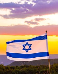 Flag of Israel waving against a beautiful sunset